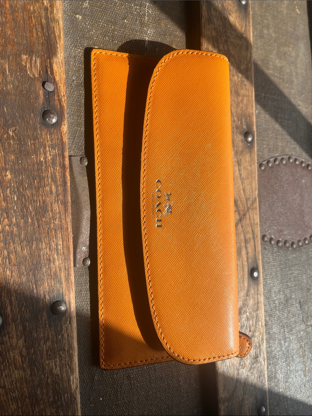 Coach Tangerine Leather Slim Wallet.